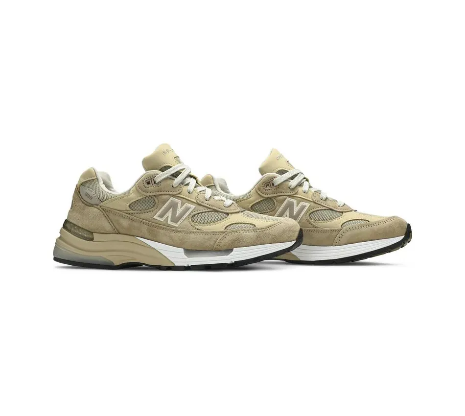 992 Tan фото